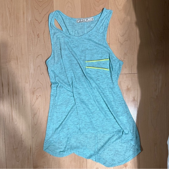 Blue tank top with accent lime green zipper on pocket. - Picture 1 of 2